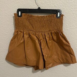 Brown faux leather shorts. Size S